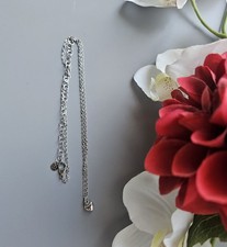 1 silber farbene Damen